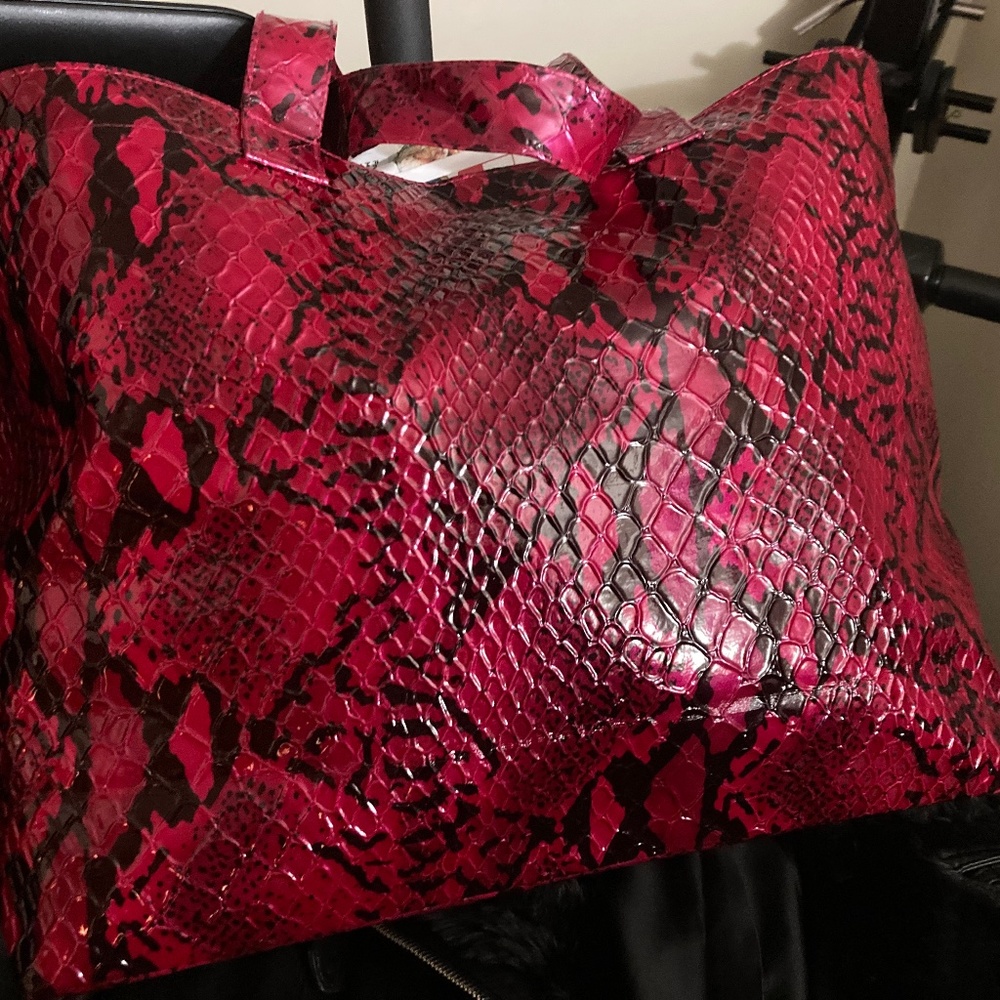Maroon snake bag